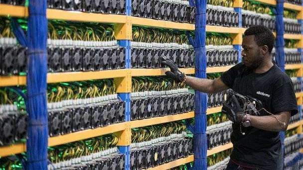 A miner assessing the efficiency of a green mining operation